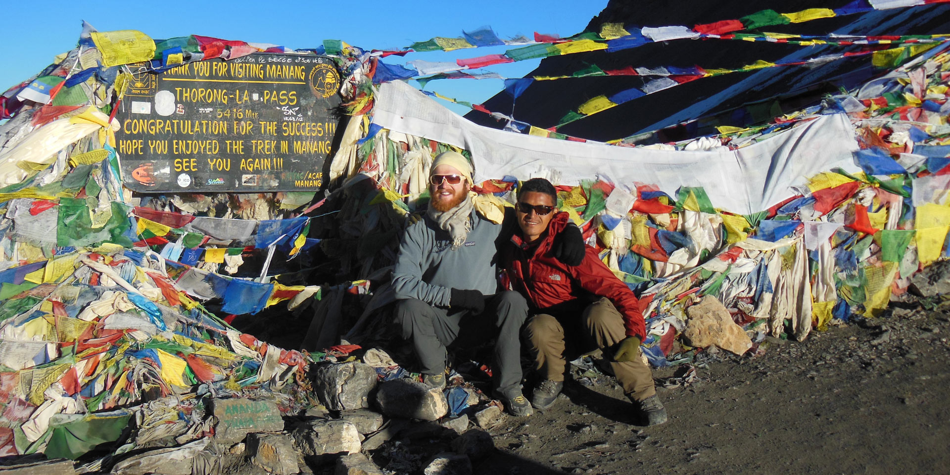 top of the Thorung La pass on the Annapurna Circuit trek